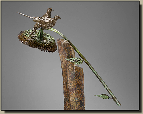 Bronze Mourning Doves on basalt column