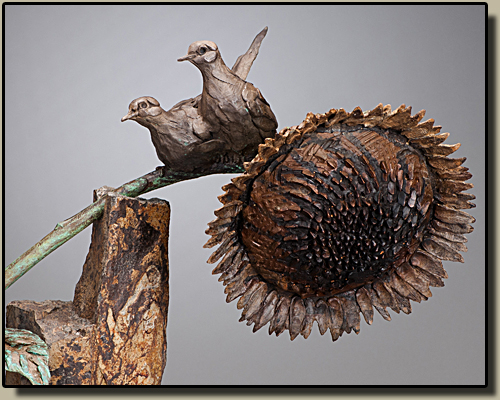 Bronze Mourning Doves on basalt column